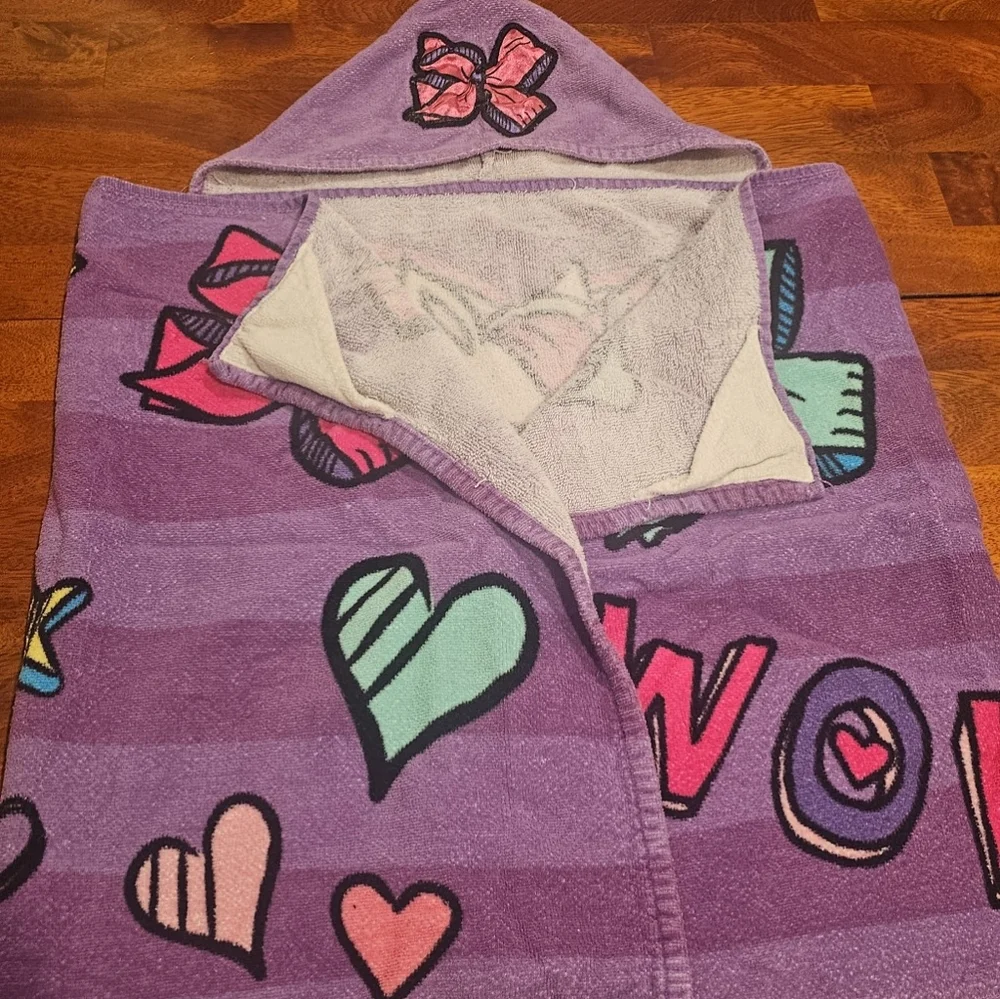 Girls like new super cut jojo siwa hooded bath towel.